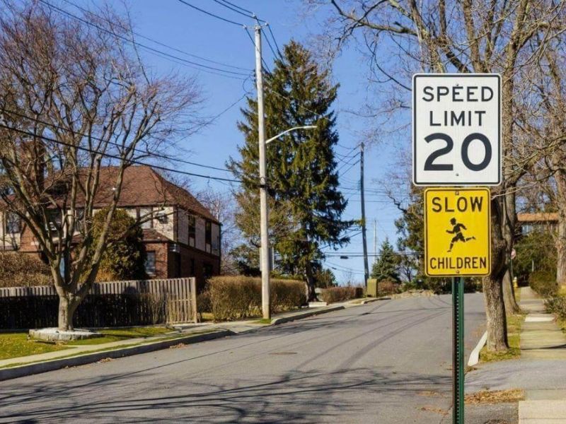 Speed limit sign on a roadside,