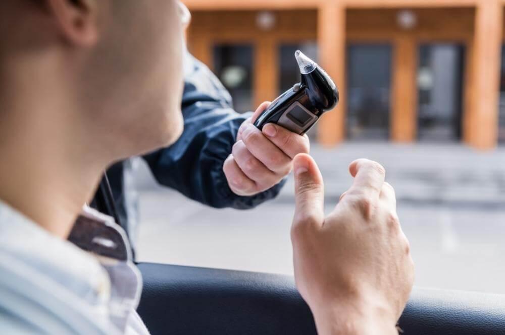 Man holding a cell phone, possibly