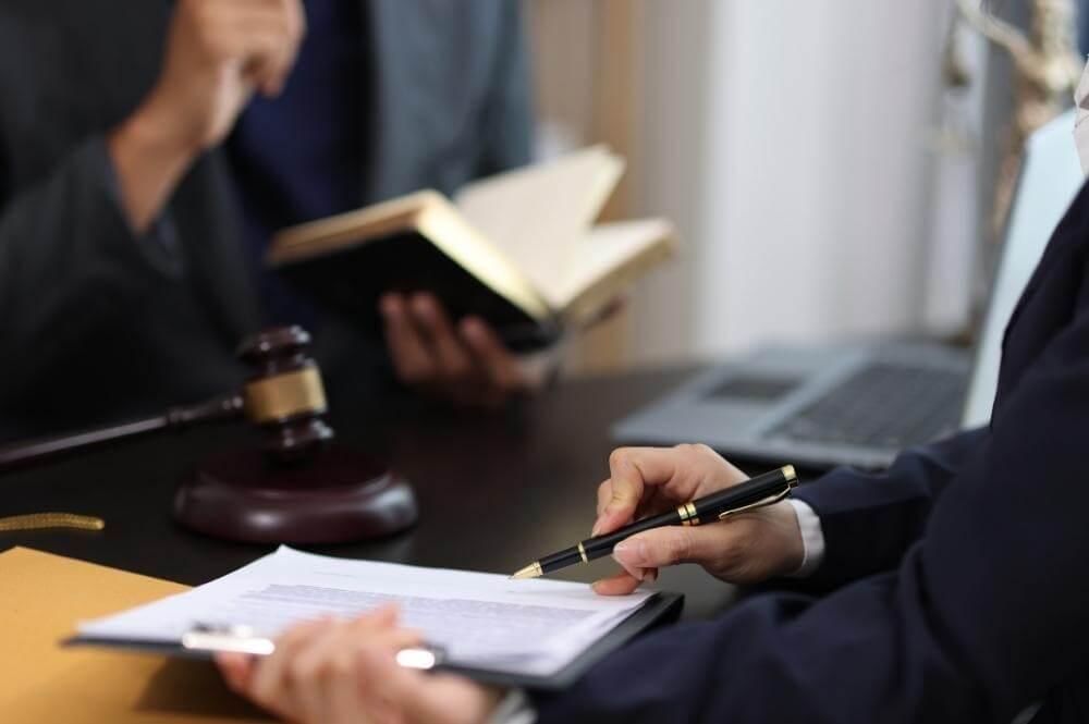 Person reviewing legal documents related to DUI defense strategy
